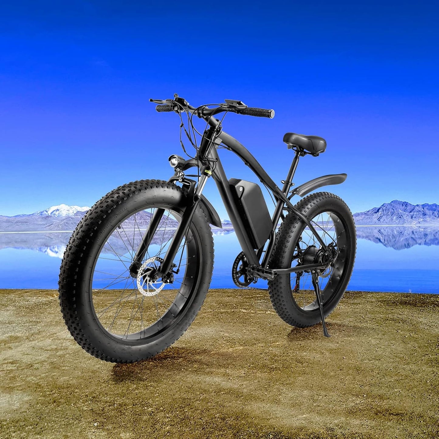 Matte black electric fat tire mountain bike side profile
Rider using e-bike on snowy terrain
Close-up of 350W rear hub motor
Heavy-duty disc brakes on fat tire
Fat tire grip on sand and off-road trails