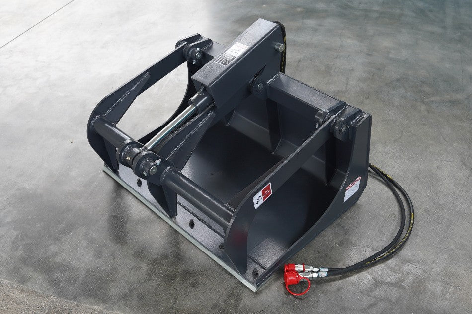 36″ Smooth Bucket Grapple for Mini Skid Steer – Front View
Hydraulic Dual-Arm Mini Skid Steer Grapple Bucket
Top Angle of 36″ Grapple Attachment on Pallet
Compact Skid Steer Grapple Bucket in Black Steel Finish