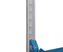 Blue portable 4-post car hoist in garage
Drive-on ramp and runway surface
Close-up of power unit and lift columns
Vehicle elevated on blue car lift
Heavy-duty safety locks and cable system