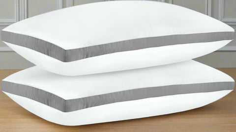 Queen Size Gusseted White Microfiber Pillows 2-Pack
Set of 2 Quilted Pillows with Grey Piping for All Sleep Positions
Medium Firm Bed Pillows for Queen Beds
Gusseted Pillow Design for Better Support and Comfort
Side View of Quilted Pillows Showing Grey Piping Details