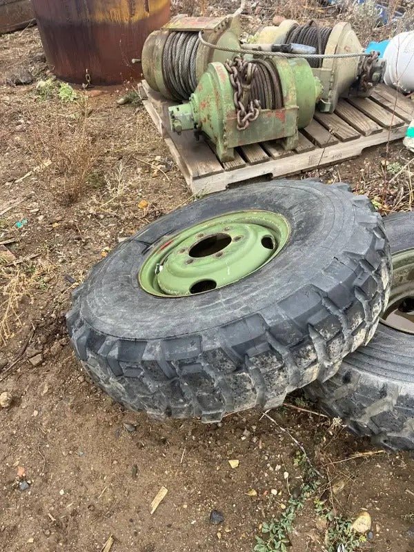 9.00R16 Michelin – Military Surplus Tire & Rim Assembly (Assorted Tread Patterns) - with Very Little Cracking if any | Sold by Uncle Wiener's Wholesale
