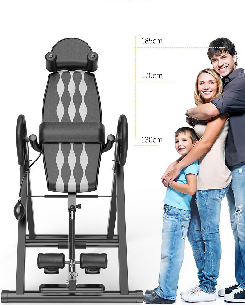 Folding inversion table for back pain relief and spinal decompression
Adjustable inversion table for home use and fitness therapy
Close-up of padded backrest and ankle support on inversion table
Foldable back stretcher in upright storage position
User on inversion table demonstrating full inversion angle
