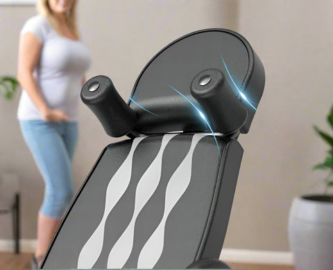 Folding inversion table for back pain relief and spinal decompression
Adjustable inversion table for home use and fitness therapy
Close-up of padded backrest and ankle support on inversion table
Foldable back stretcher in upright storage position
User on inversion table demonstrating full inversion angle