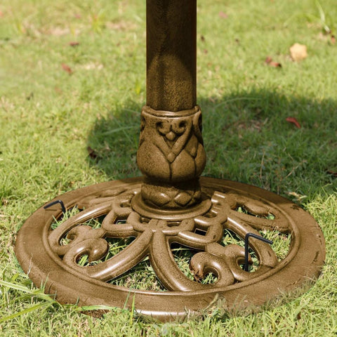 Antique copper polyresin bird bath with solar fountain
Top-down view of bird bath basin and solar pump
Decorative outdoor bird bath with stable pedestal base
Multiple fountain head options for water spray pattern
Garden setting with bird bath and solar-powered water feature