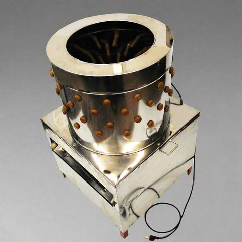PM60 stainless steel automatic chicken plucker with top view
Inside of poultry plucker showing rubber fingers
PM80 large-capacity chicken plucker with waterproof housing
Stainless steel feather remover for farm use
Control box and motor housing on automatic chicken plucker