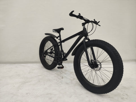 Deviant 26 inch fat tire bike side view on beach
Close-up of Shimano gear and disc brakes
All-terrain mountain bike with wide tires
Fat bike for snow, sand, and trails - Deviant 26 inch