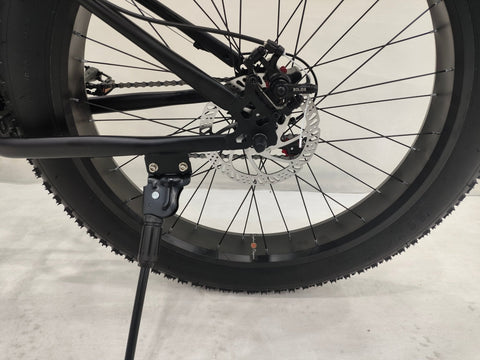 Deviant 26 inch fat tire bike side view on beach
Close-up of Shimano gear and disc brakes
All-terrain mountain bike with wide tires
Fat bike for snow, sand, and trails - Deviant 26 inch