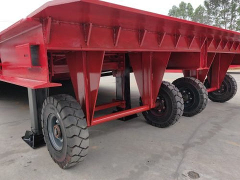 Red industrial dock ramp with steel traction grating