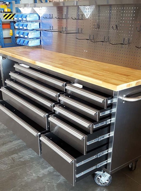 84" stainless steel tool bench with LED lighting and drawers
Solid wood top garage workbench with 11 storage drawers
Professional stainless steel tool station with LED bar
Close-up of drawer handles on heavy-duty tool bench
Industrial workbench with built-in lights and hardwood surface
