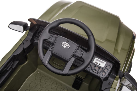 Olive green Toyota-style ride-on pickup truck for kids
Side view of remote-control kids truck with leather seat
Child’s electric ride-on truck with LED headlights
Toyota ride-on truck in olive green with suspension
Battery-powered pickup truck for toddlers