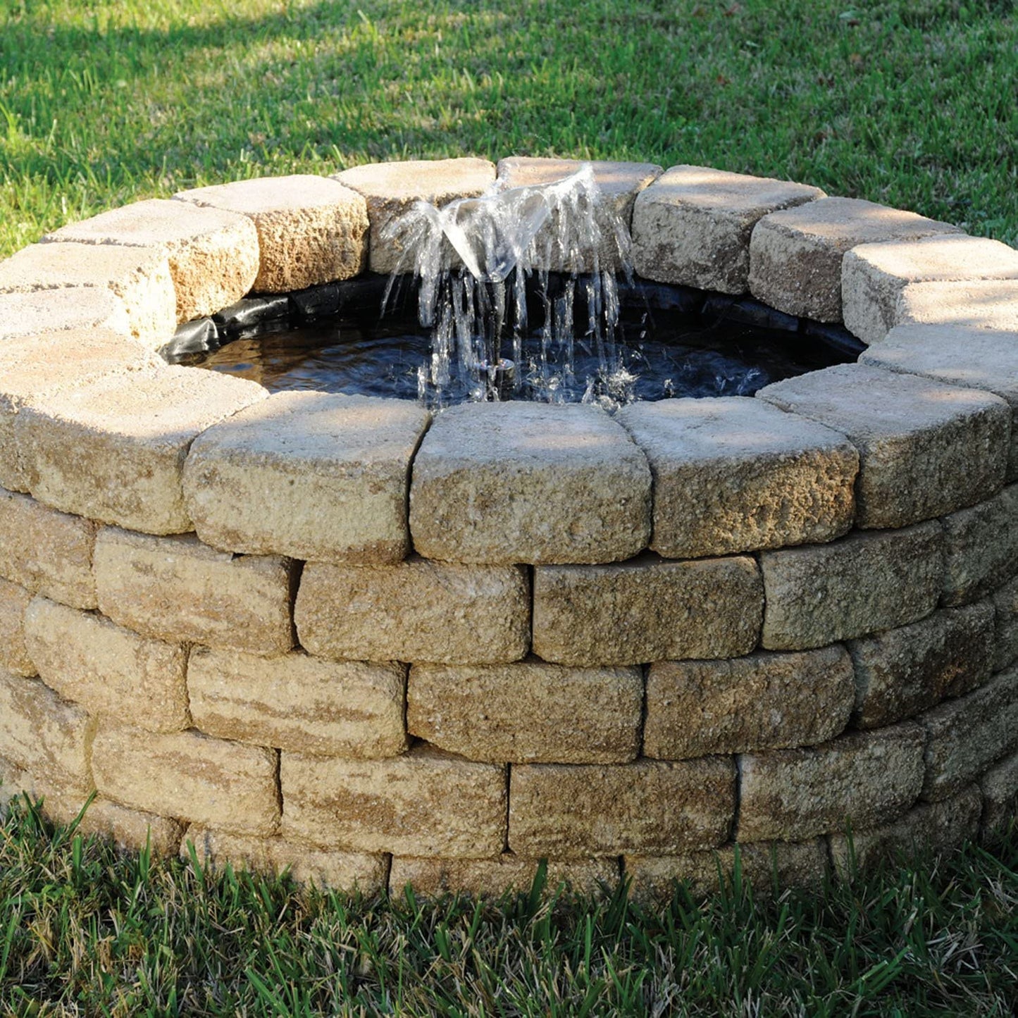 Completed Backyard Pond – Liner Covered with Stones