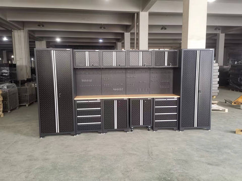 Full 17-piece diamond plate garage cabinet set
Side view of heavy-duty steel tool bench system
Overhead cabinets and drawers with diamond plate finish
Tool bench workstation with storage drawers
Black powder-coated steel cabinet close-up