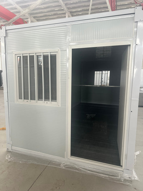 Exterior Image: Portable 19 FT Folding Insulated Container Office with Lockable Door – Outdoor View
Interior Image: Inside View of Modular Prefab Cabin Office with Window and Electrical Plug
Folded View: Foldable Prefab Container for Easy Transport and Setup
Setup Process: Step-by-step Setup of 19 FT Folding Steel Container Office
Multiple Angles: Various Views of the Portable Modular Work Cabin