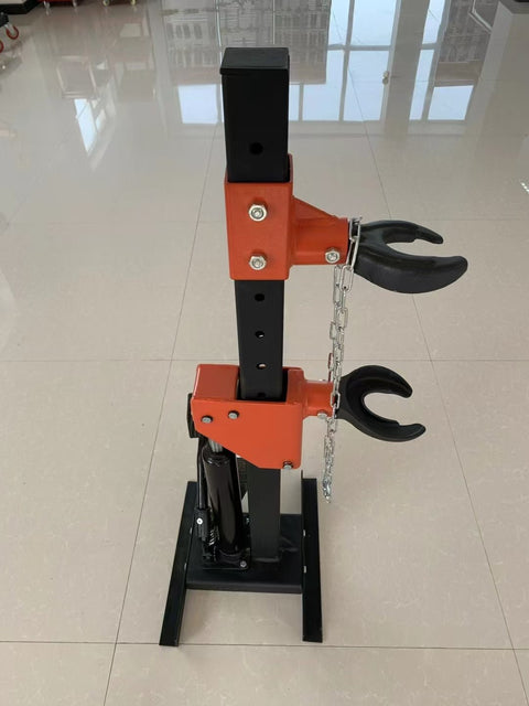 2200 LB Hydraulic Spring Compressor – Full View with Orange & Black Finish
Heavy-Duty Foot Pedal Spring Compressor in Action – Automotive Use
Adjustable Coil Spring Compressor with Safety Lock Positions
Side View of Hydraulic Shop Tool for Suspension Work
