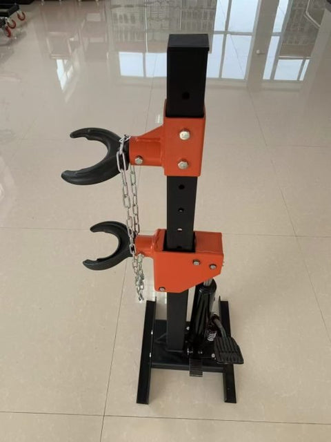 2200 LB Hydraulic Spring Compressor – Full View with Orange & Black Finish
Heavy-Duty Foot Pedal Spring Compressor in Action – Automotive Use
Adjustable Coil Spring Compressor with Safety Lock Positions
Side View of Hydraulic Shop Tool for Suspension Work