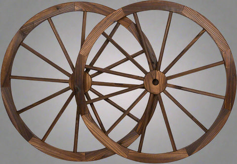 "Rustic wooden wagon wheel 48 inch for garden decor"
"Burnt wood wagon wheel leaning against a fence"
"Farmhouse yard display with decorative wooden wheels"
