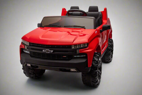 Red Chevrolet ride-on pickup truck for kids with open doors
Front view of Chevrolet kids ride-on with LED lights
Side view of red 24V Chevrolet electric truck toy
Remote-controlled kids electric pickup truck in red
Ride-on truck with Bluetooth and leather seating for children