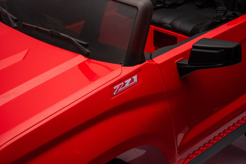 Red Chevrolet ride-on pickup truck for kids with open doors
Front view of Chevrolet kids ride-on with LED lights
Side view of red 24V Chevrolet electric truck toy
Remote-controlled kids electric pickup truck in red
Ride-on truck with Bluetooth and leather seating for children
