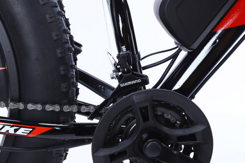 26 inch electric fat tire e-bike with 500W motor and disc brakes
Side view of black all-terrain e-bike with oversized tires
Removable 48V lithium battery on mountain fat tire e-bike
Close-up of rear hub motor and gear system on electric bike
Electric trail bike designed for snow, sand, and rugged terrain
Urban and off-road ready fat tire e-bike with aluminum frame