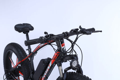 26 inch electric fat tire e-bike with 500W motor and disc brakes
Side view of black all-terrain e-bike with oversized tires
Removable 48V lithium battery on mountain fat tire e-bike
Close-up of rear hub motor and gear system on electric bike
Electric trail bike designed for snow, sand, and rugged terrain
Urban and off-road ready fat tire e-bike with aluminum frame