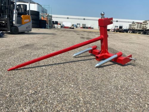 Red 3-point gooseneck hitch with bale spear mount
Tractor trailer hitch attachment with hay spear slots
Reinforced hitch frame for Conus 2 and Conus 1 spear placement
3-point trailer hitch attachment mounted on tractor
Spear holes and 2” trailer receiver on attachment frame