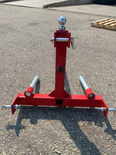 Red 3-point gooseneck hitch with bale spear mount
Tractor trailer hitch attachment with hay spear slots
Reinforced hitch frame for Conus 2 and Conus 1 spear placement
3-point trailer hitch attachment mounted on tractor
Spear holes and 2β trailer receiver on attachment frame