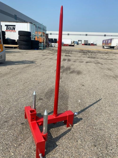 Red 3-point gooseneck hitch with bale spear mount
Tractor trailer hitch attachment with hay spear slots
Reinforced hitch frame for Conus 2 and Conus 1 spear placement
3-point trailer hitch attachment mounted on tractor
Spear holes and 2β trailer receiver on attachment frame