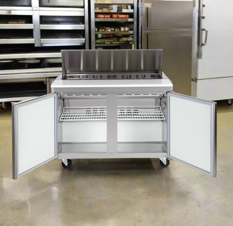 4ft stainless steel salad sandwich prep table with cutting board
Commercial prep table with refrigerated storage
Open sandwich station showing interior shelves and pans