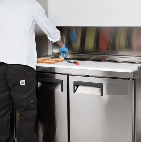 4ft stainless steel salad sandwich prep table with cutting board
Commercial prep table with refrigerated storage
Open sandwich station showing interior shelves and pans