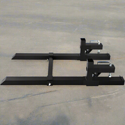 43-inch clamp-on pallet forks with stabilizer bar installed on tractor
Skid steer pallet forks loading hay bales
Adjustable clamp pallet forks for farm and industrial use
Tractor bucket pallet fork attachment with 4,000 lb capacity
Clamp-on pallet forks close-up showing tension screws and bracket