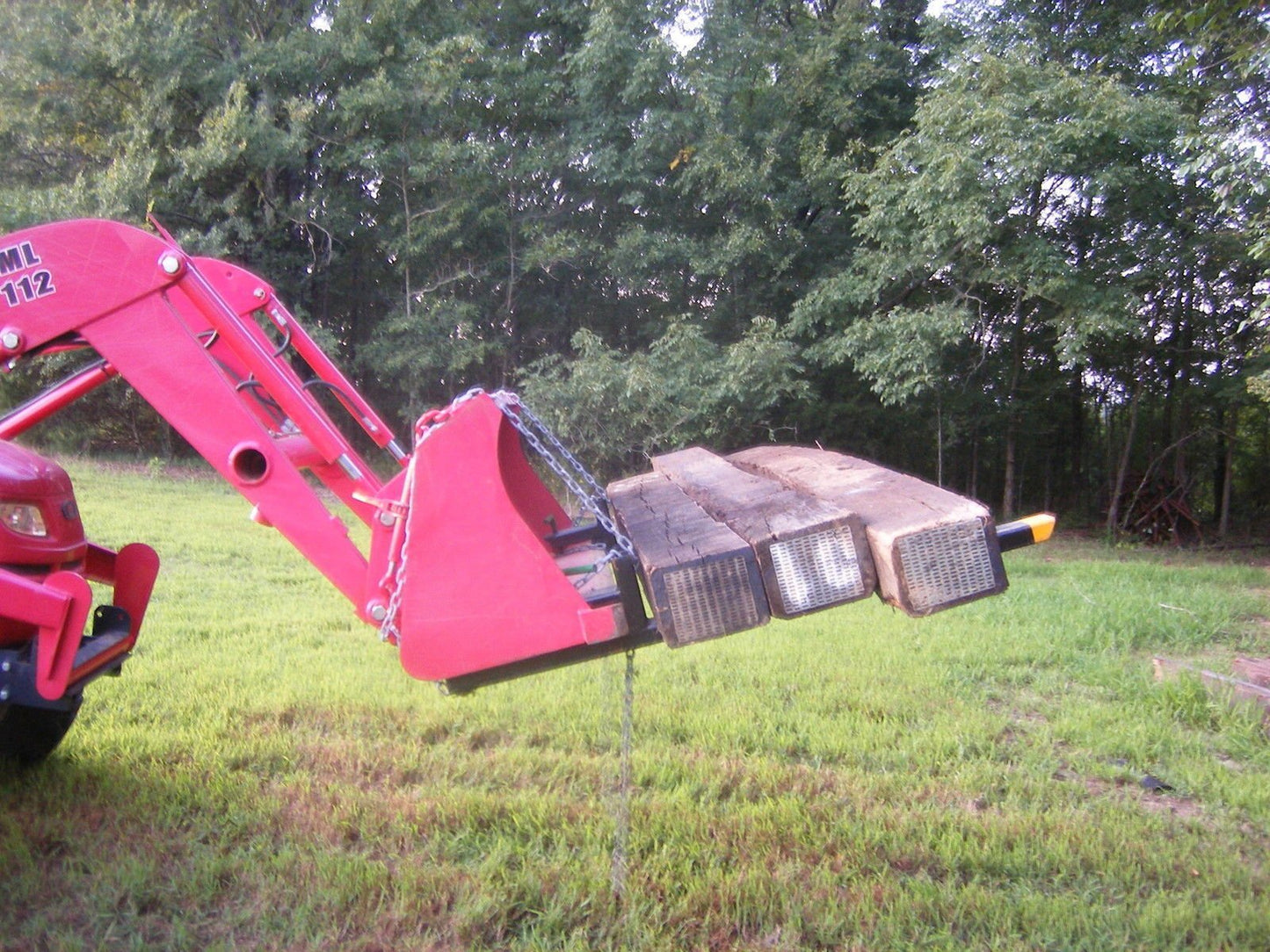 "43 Inch Heavy Duty Clamp On Bucket Forks for Tractor"
"2,000 LB Capacity Pallet Forks for Skid Steer and Tractor"
"Clamp On Fork Attachments for Tractor Buckets"
"Heavy Duty Steel Bucket Forks for Moving Pallets and Logs"