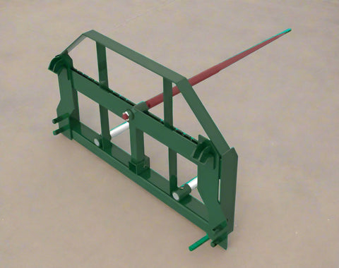 Heavy-duty green hay frame with bale spear for John Deere loader
John Deere-compatible bale spear attachment with headache rack
4500 LB hay spear frame with Conus 2 spear and fork slots