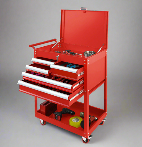 Garage tool cabinet with tools stored in foam-lined drawers and bottom shelf