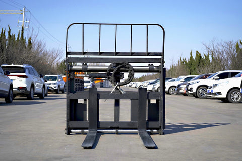 Side view of 5000 lb side shift pallet forks for skid steer
Heavy-duty hydraulic pallet fork with side shift mechanism
Pallet fork attachment mounted on forklift outdoors
Black steel frame skid steer pallet forks with side shift
Industrial pallet forks for warehouse and yard use