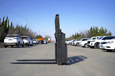 Side view of 5000 lb side shift pallet forks for skid steer
Heavy-duty hydraulic pallet fork with side shift mechanism
Pallet fork attachment mounted on forklift outdoors
Black steel frame skid steer pallet forks with side shift
Industrial pallet forks for warehouse and yard use