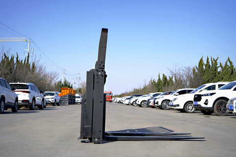 Side view of 5000 lb side shift pallet forks for skid steer
Heavy-duty hydraulic pallet fork with side shift mechanism
Pallet fork attachment mounted on forklift outdoors
Black steel frame skid steer pallet forks with side shift
Industrial pallet forks for warehouse and yard use