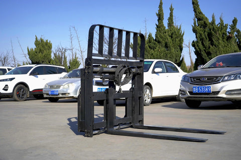 Side view of 5000 lb side shift pallet forks for skid steer
Heavy-duty hydraulic pallet fork with side shift mechanism
Pallet fork attachment mounted on forklift outdoors
Black steel frame skid steer pallet forks with side shift
Industrial pallet forks for warehouse and yard use
