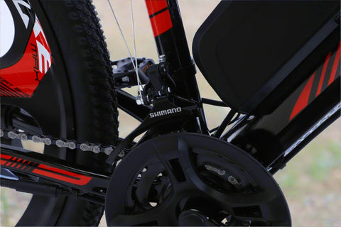 500W electric mountain bike with 26 inch wheels and disc brakes
Rear hub motor and 48V battery mounted on aluminum frame
Side view of electric mountain bike with front suspension
Handlebar and display panel of 21-speed electric bike
29 inch aluminum electric bike with 48V lithium battery