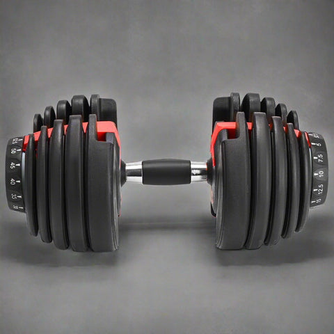 52.5 lb adjustable dumbbell with metal handle and rubber-coated plates
Side view of single adjustable dumbbell for compact home gym use
Unboxed adjustable dumbbell set with weight plate configuration
Compact strength training dumbbell with ergonomic grip