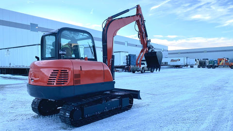 6 Ton Red Mini Excavator at Work in Snow – Side View
Compact Tracked Excavator – Hydraulic Boom in Operation
Mini Excavator Digging in Construction Zone – Model 1027621
Tracked Compact Excavator on Job Site – Red Machine Front View