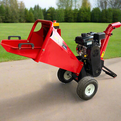 6.5 HP Wood Chipper with Briggs & Stratton engine – side view
Red GS100 wood chipper – front chute and wheels
Compact gasoline-powered wood chipper in garage setup
Rear view of GS100 chipper with large discharge chute