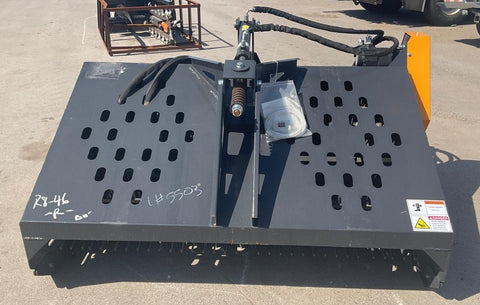 "68 inch skid steer landscape rake bucket with hydraulic top cover"
"Heavy-duty grading tool for skid steer loaders"
"Landscape rake with travel skids and handheld remote"
"Hydraulic rake attachment in action on construction site"