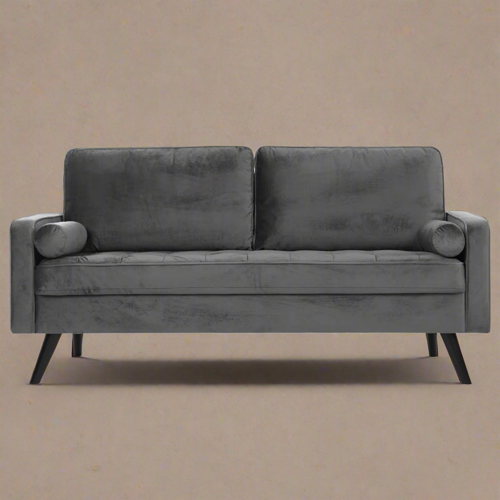 69.7-inch modern velvet sofa in navy blue with tufted back
Gray velvet upholstered sofa with pillows
Side view of modern green couch with wooden legs
Mid-century couch with tufted back and square arms