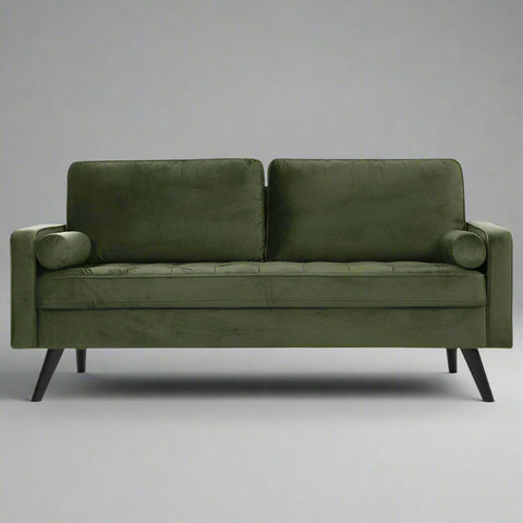 69.7-inch modern velvet sofa in navy blue with tufted back
Gray velvet upholstered sofa with pillows
Side view of modern green couch with wooden legs
Mid-century couch with tufted back and square arms
