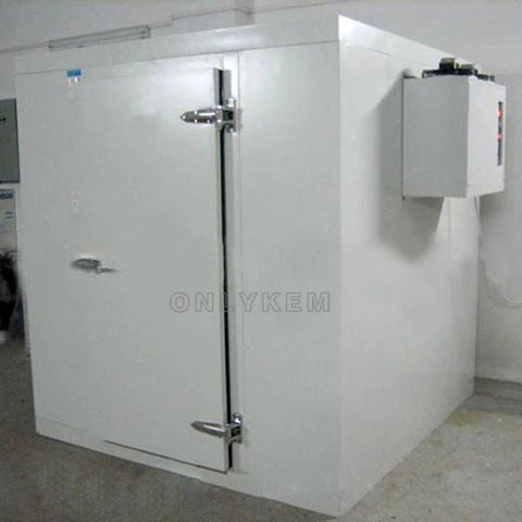 “Commercial walk-in freezer installed in warehouse”
“Modular cold room with open door and interior view”
“Flat-packed walk-in cooler components and hardware”
“Exterior view of insulated freezer unit panel walls”
“Walk-in chiller unit with digital controller and lockable door”