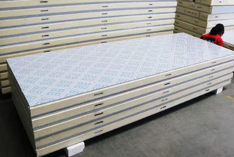 “Commercial walk-in freezer installed in warehouse”
“Modular cold room with open door and interior view”
“Flat-packed walk-in cooler components and hardware”
“Exterior view of insulated freezer unit panel walls”
“Walk-in chiller unit with digital controller and lockable door”