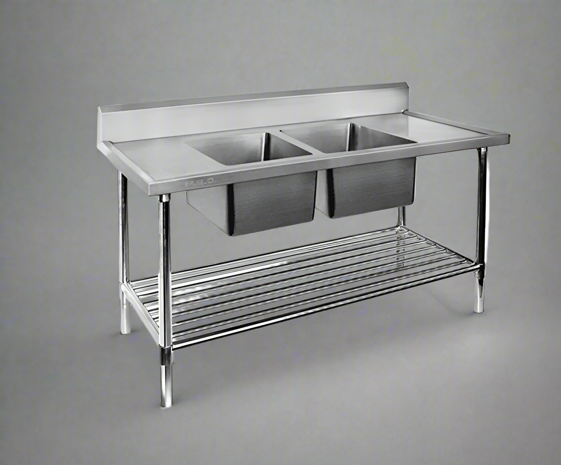 Stainless steel double sink table with undershelf
Commercial two-compartment sink with backsplash
70” industrial kitchen sink with polished finish