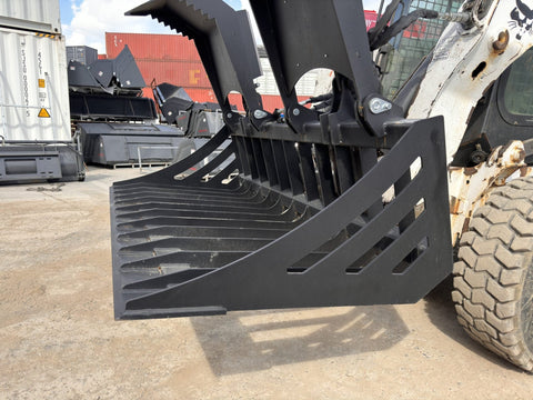 72" hydraulic grapple bucket on skid steer
Skid steer rock grapple front view
Close-up of grapple teeth and hoses
Dual-cylinder grapple open position
Grapple attachment lifting heavy debris