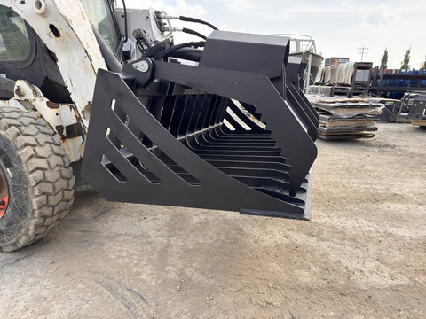 72" hydraulic grapple bucket on skid steer
Skid steer rock grapple front view
Close-up of grapple teeth and hoses
Dual-cylinder grapple open position
Grapple attachment lifting heavy debris