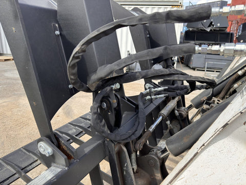 72" hydraulic grapple bucket on skid steer
Skid steer rock grapple front view
Close-up of grapple teeth and hoses
Dual-cylinder grapple open position
Grapple attachment lifting heavy debris